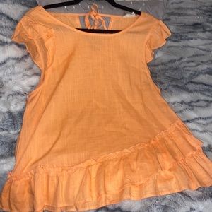 Boutique Fluttering into spring orange Top ( new with tags)